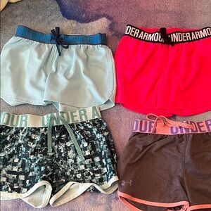 Under Armour Girls Athletic 4 pairs of Shorts size medium.